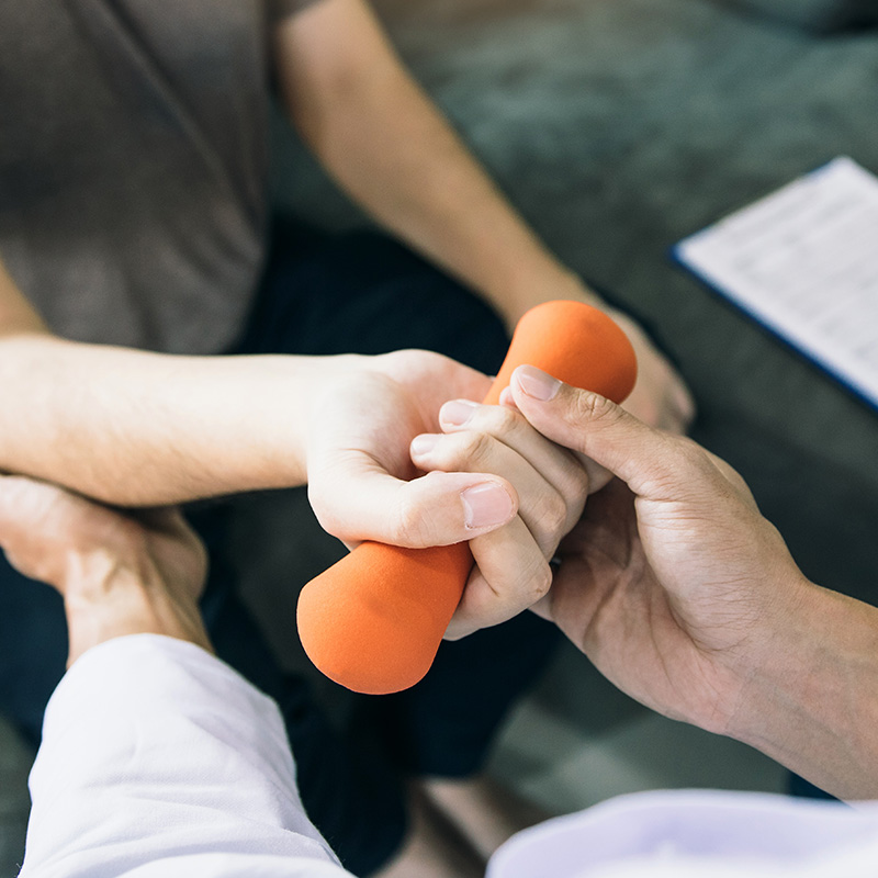 dumbbell-exercise-at-home-with-healthcare-professi-2026-01-07-00-03-16-utcV_hand_